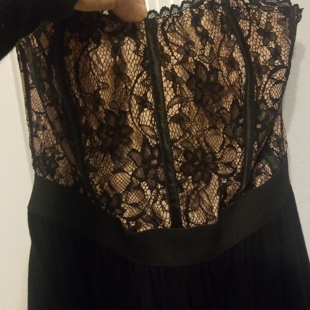 Strapless black dress.
